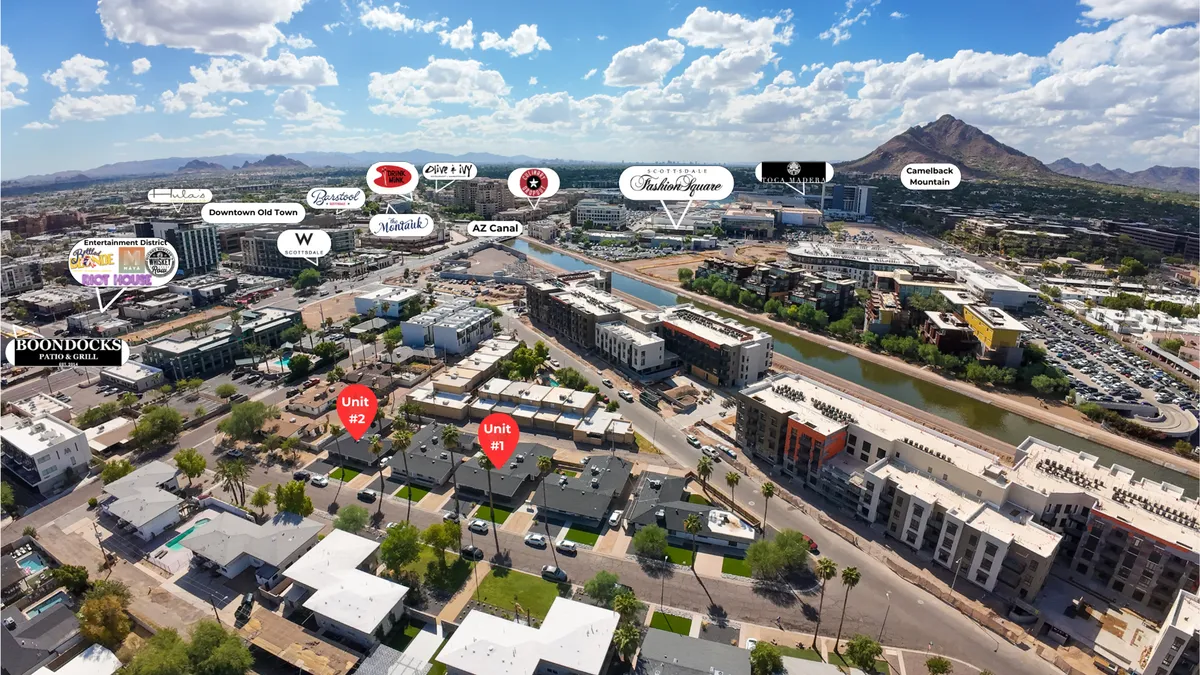 A scenic view that includes both unit #1 and unit #2, set along the Arizona Canal with Downtown Old Town and Camelback Mountain in the background. The urban energy and serene canal setting blend together seamlessly.